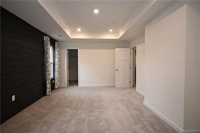 a bathroom with a double vanity sink a toilet and a mirror