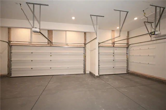 a balcony with wooden floor and trees