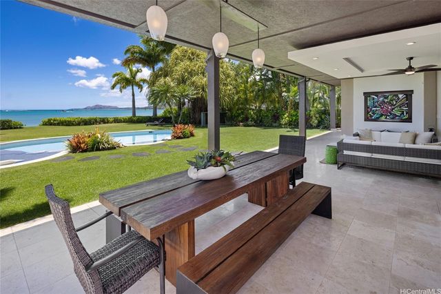 a view of a patio with a backyard