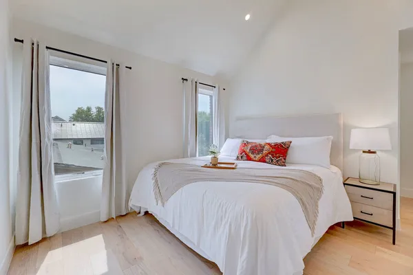 a bath room with a large window