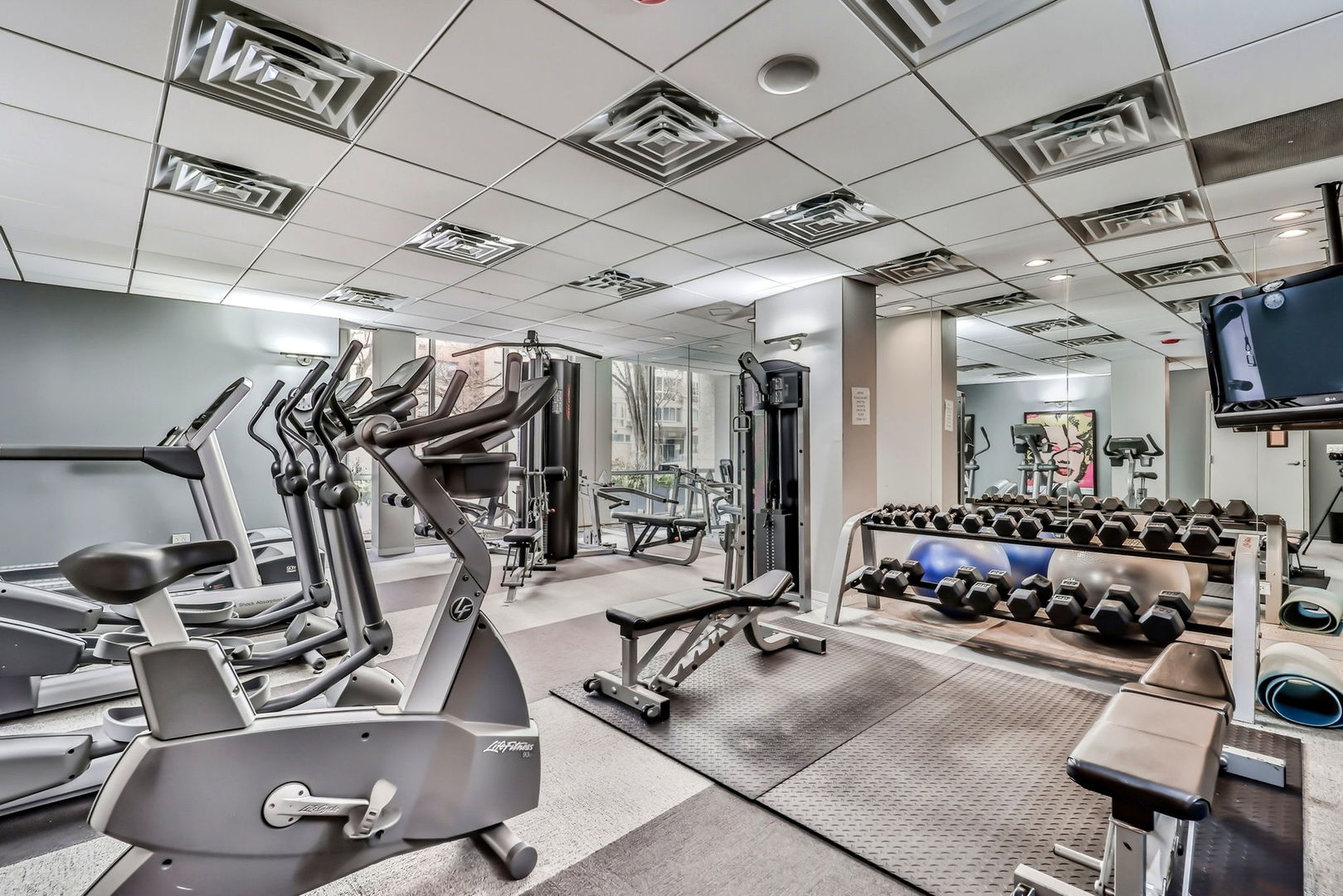 2930 North Sheridan Road, Unit 1912 Chicago, IL 60657 - Photo 22 of 25 a view of a room with gym equipment