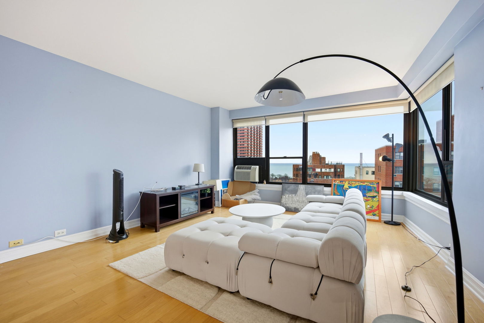 2930 North Sheridan Road, Unit 1912 Chicago, IL 60657 - Photo 4 of 25 a bedroom with a bed and a large window