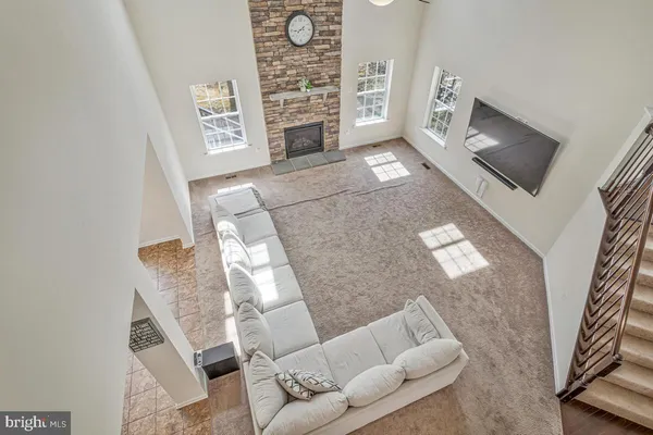 a large kitchen with a table and chairs