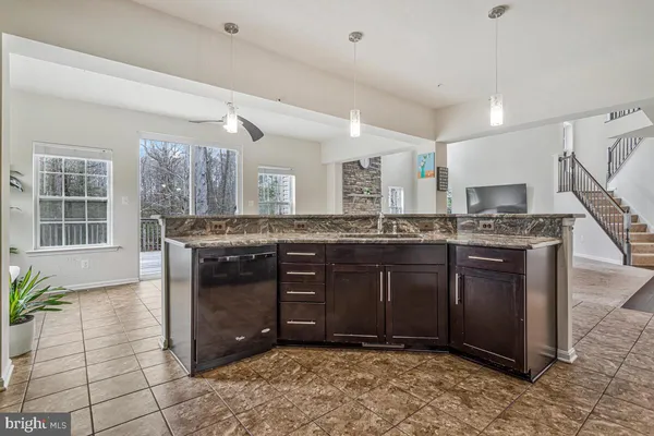 a view of a livingroom with furniture and windows