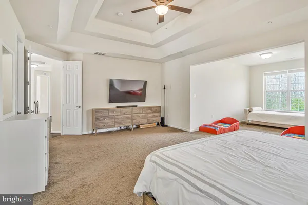 a bathroom with a sink double vanity and a mirror