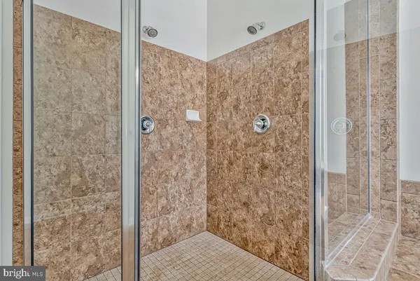 a bedroom with a bed chair and window