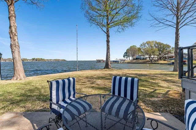 a view of a balcony with lake view and mountain view