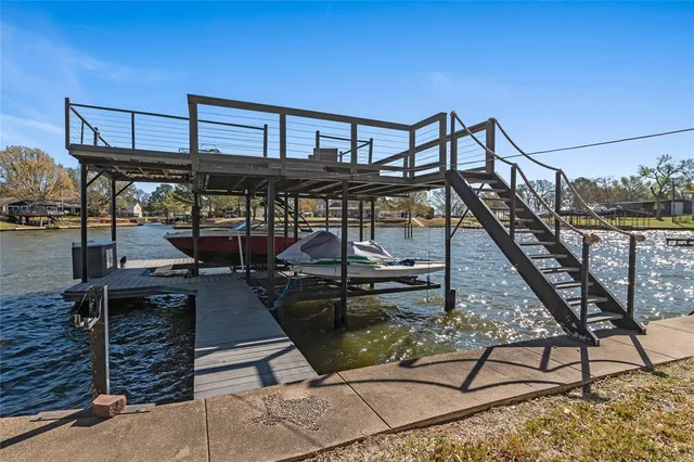 a view of a balcony with chairs