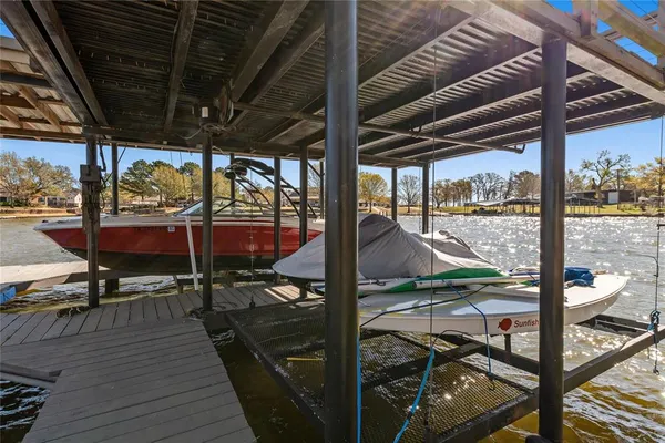 a view of a terrace with wooden floor and city view