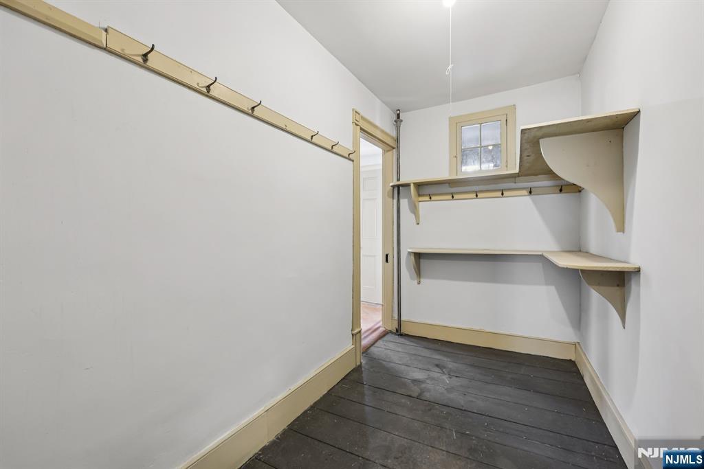 142 Island Road Mahwah, NJ 07430 - Photo 20 of 46 a view of walk in closet with empty racks