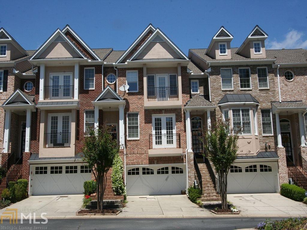 1025 Emory Parc Place Decatur, GA 30033 - Photo 1 of 1 a front view of multiple houses