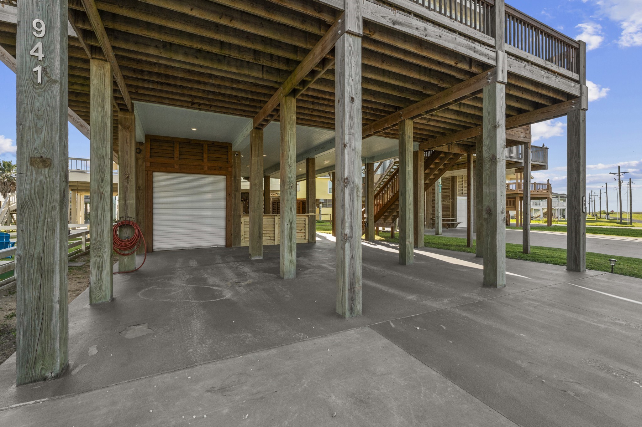 941 South Gateway Road Crystal Beach, TX 77650 - Photo 28 of 43 a view of a house with porch