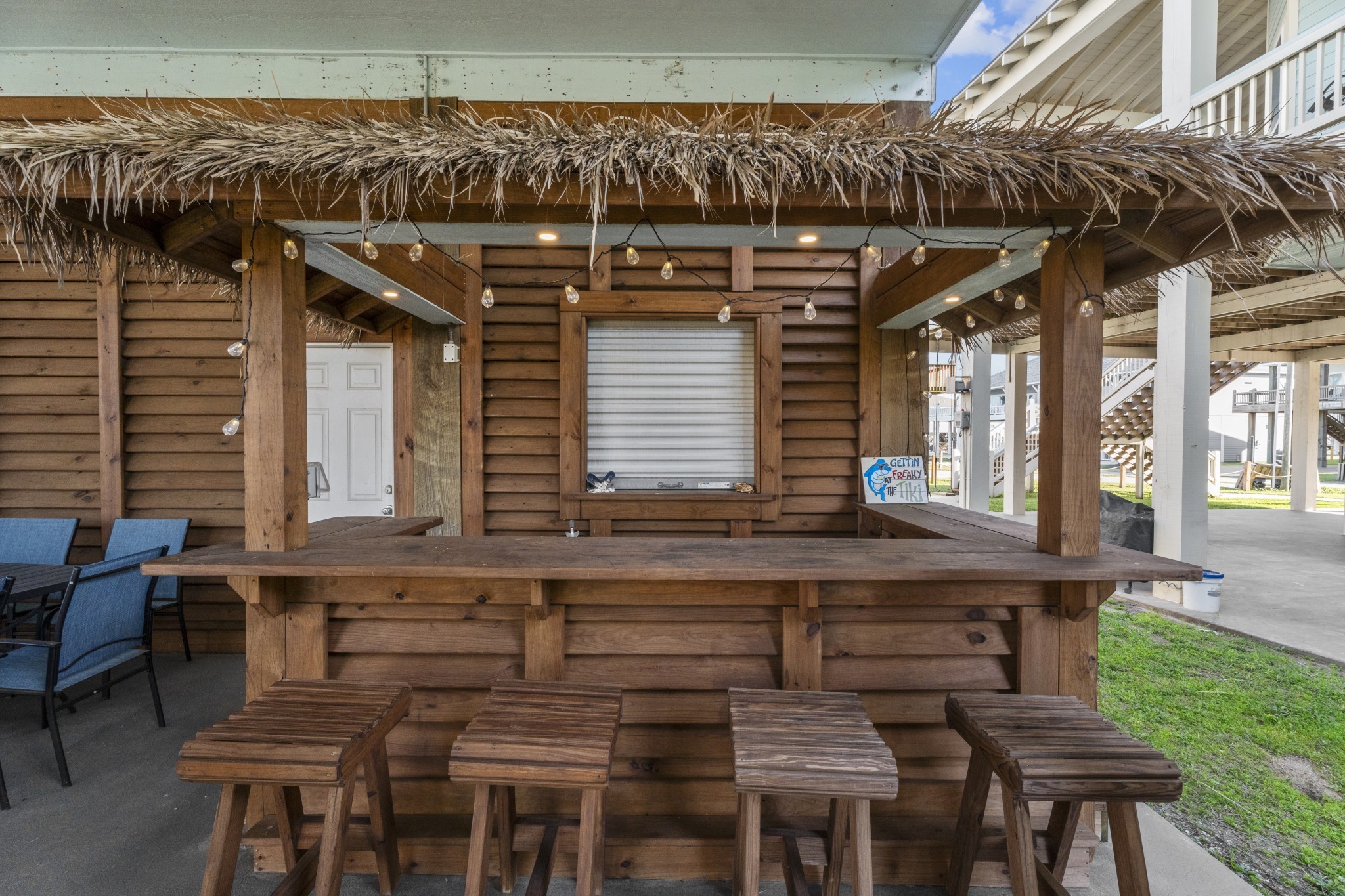941 South Gateway Road Crystal Beach, TX 77650 - Photo 29 of 43 a view of a chairs and table in a patio
