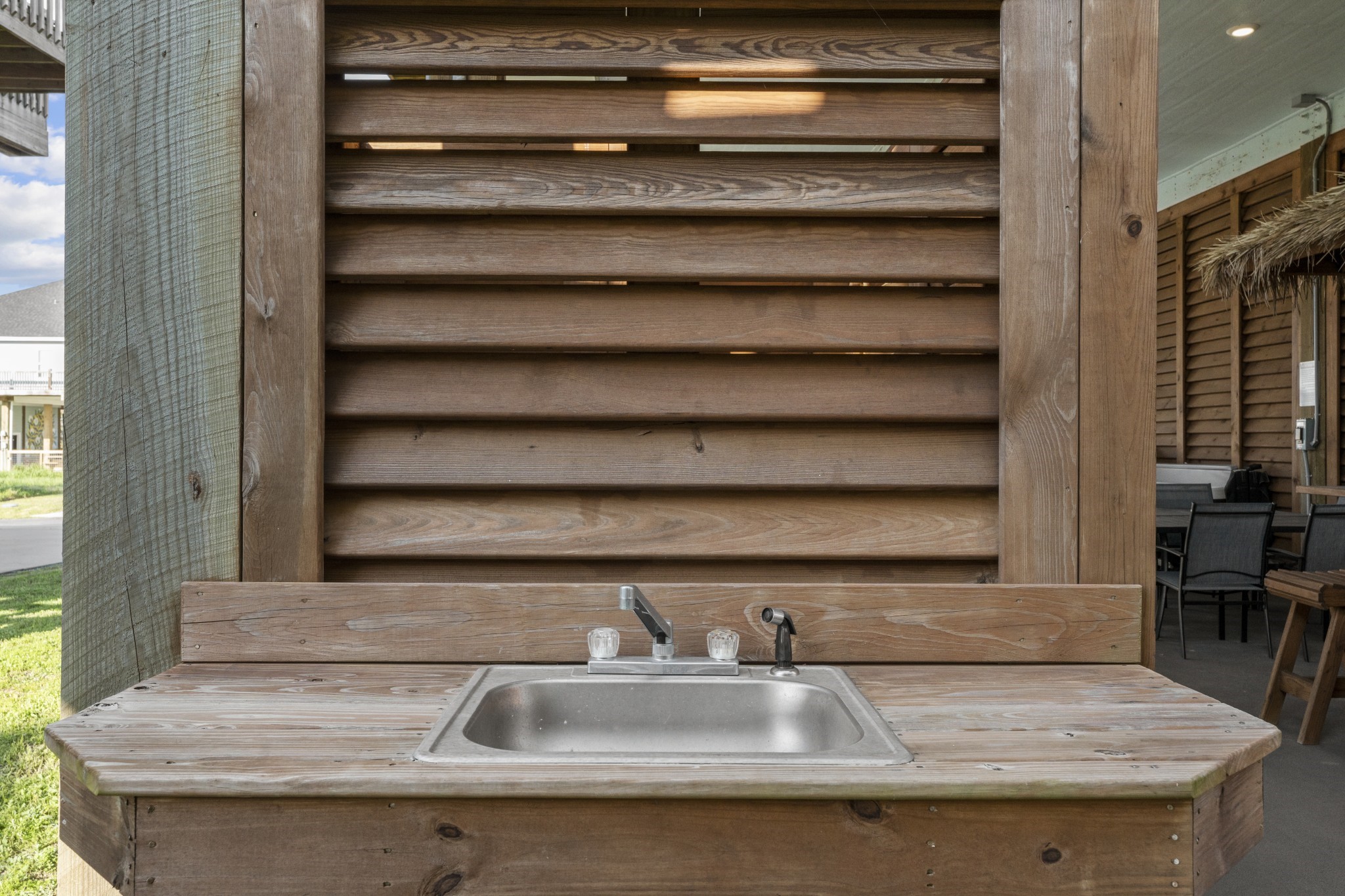 941 South Gateway Road Crystal Beach, TX 77650 - Photo 30 of 43 a bathroom with a sink and a mirror
