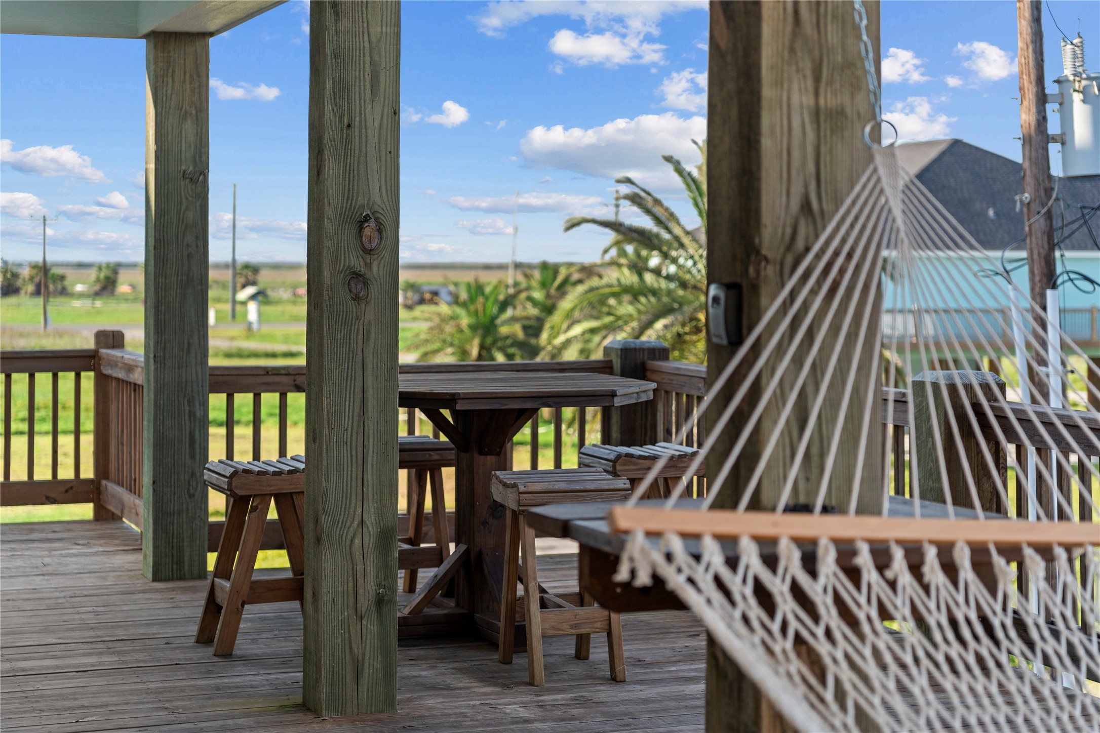 941 South Gateway Road Crystal Beach, TX 77650 - Photo 35 of 43 a view of a balcony with chairs