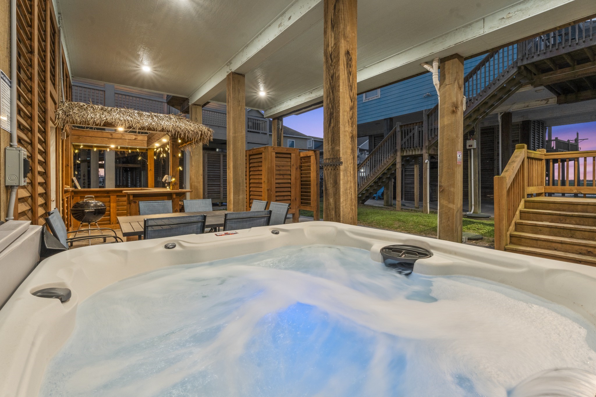 941 South Gateway Road Crystal Beach, TX 77650 - Photo 41 of 43 a view of a hall with a lounge chair