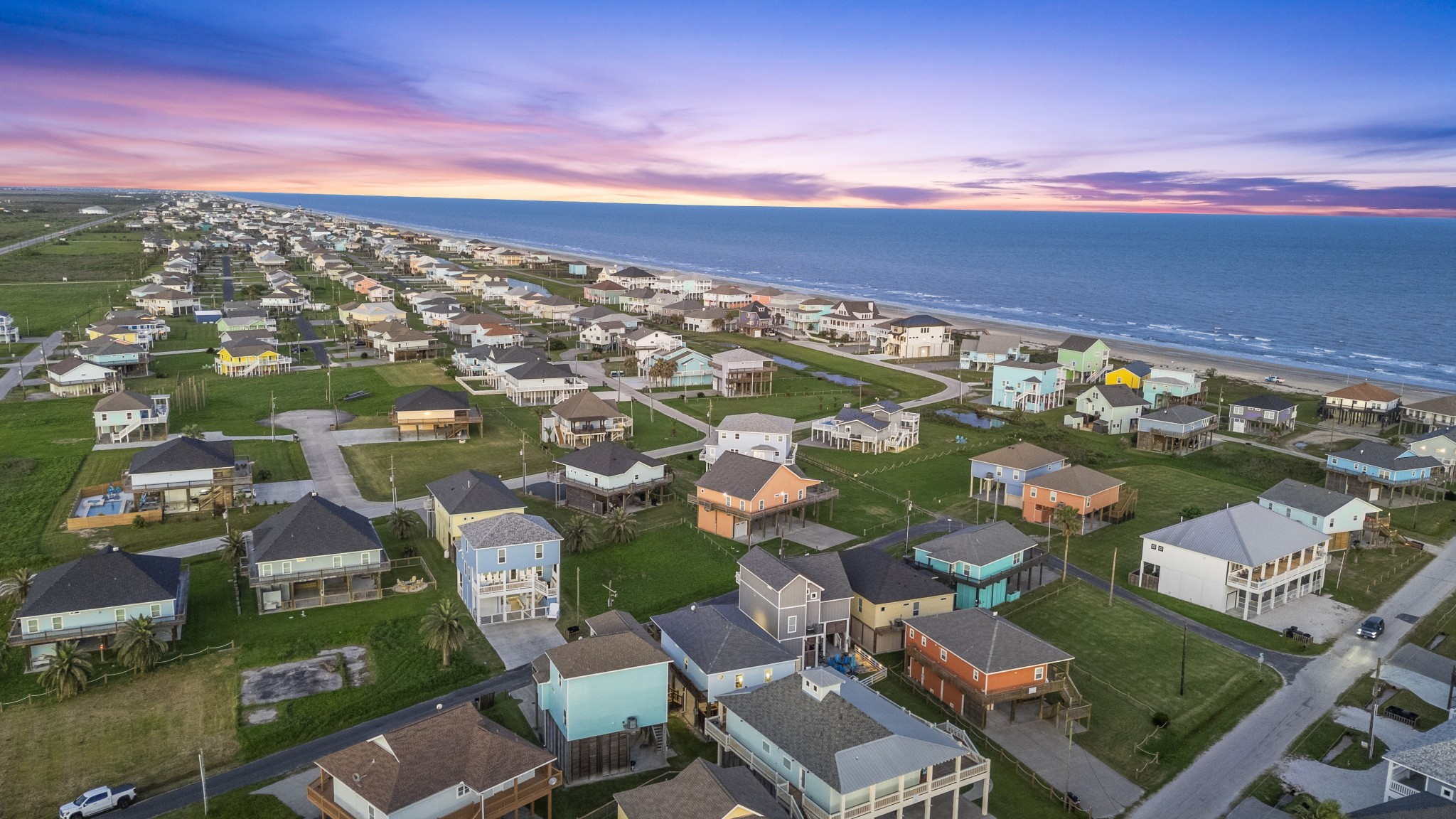 941 South Gateway Road Crystal Beach, TX 77650 - Photo 42 of 43 an aerial view of residential houses with outdoor space