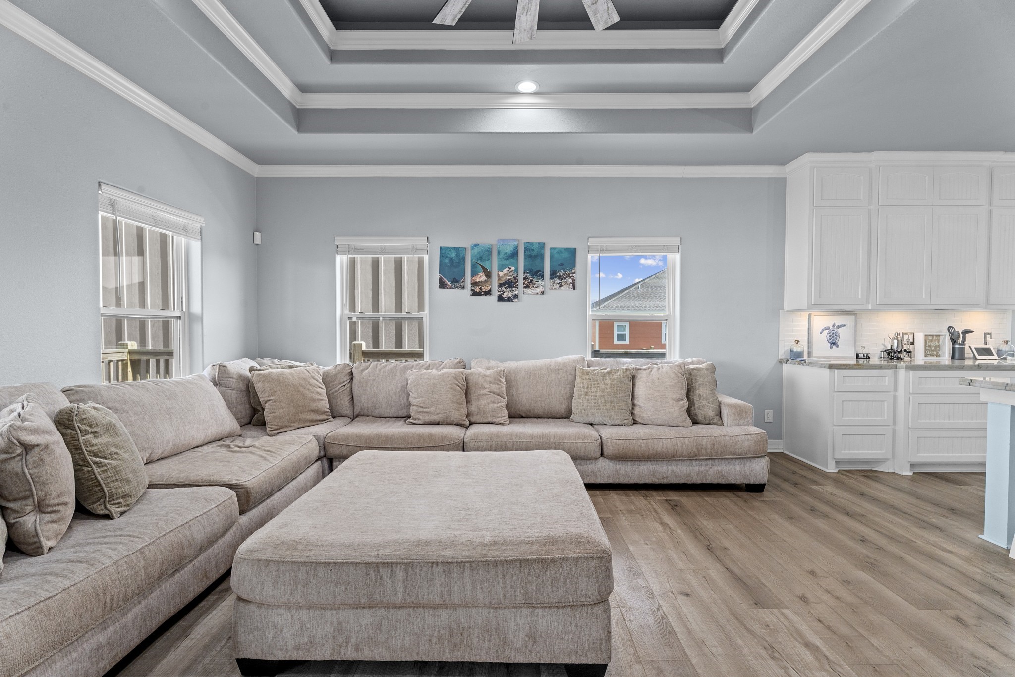 941 South Gateway Road Crystal Beach, TX 77650 - Photo 7 of 43 a living room with furniture and a wooden floor