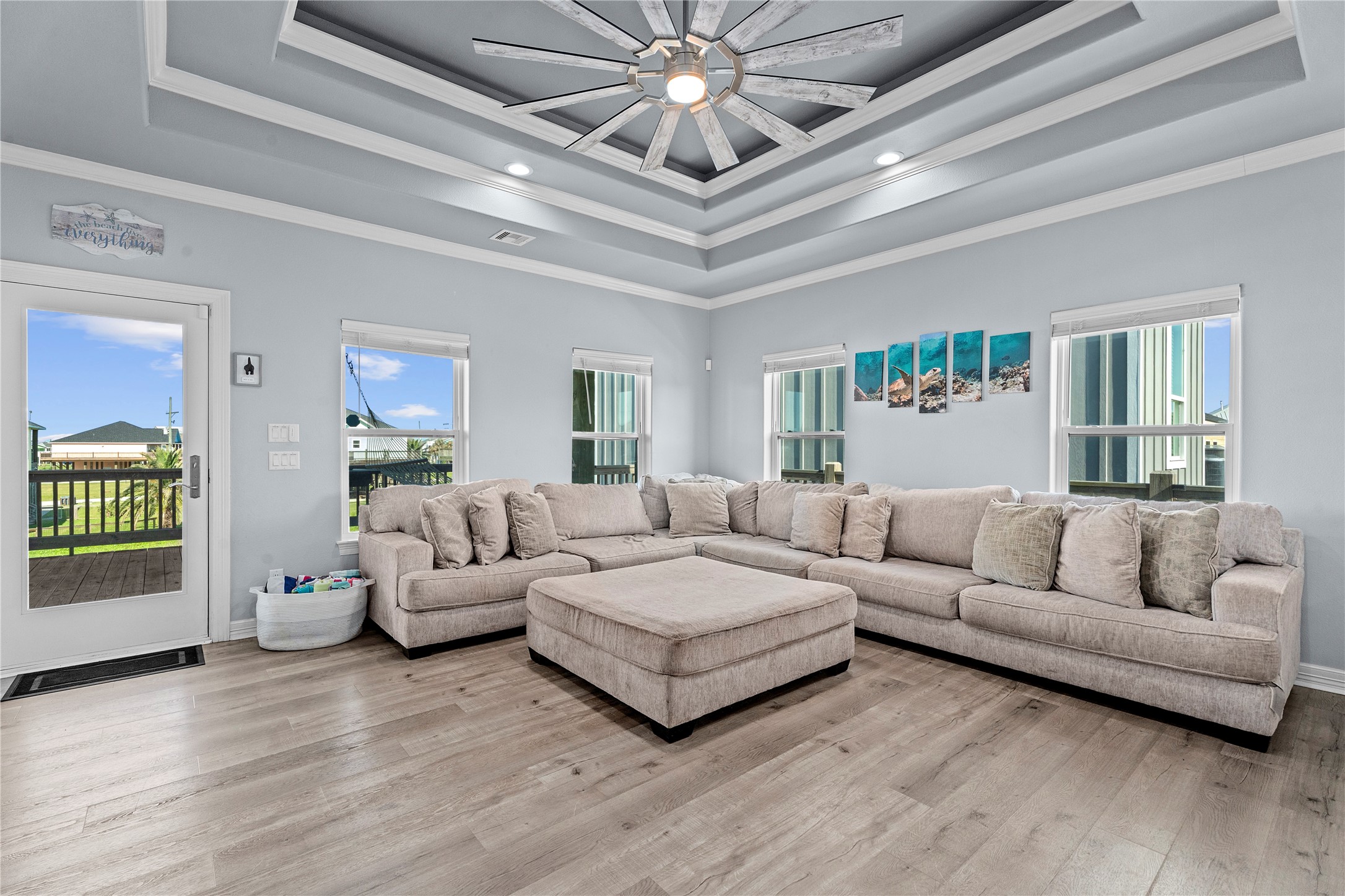 941 South Gateway Road Crystal Beach, TX 77650 - Photo 8 of 43 a living room with furniture and a large window