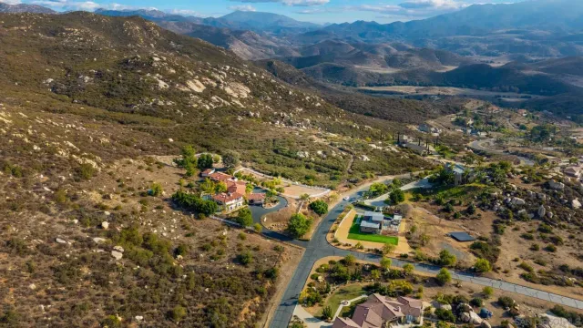 a view of mountain view with lots of trees