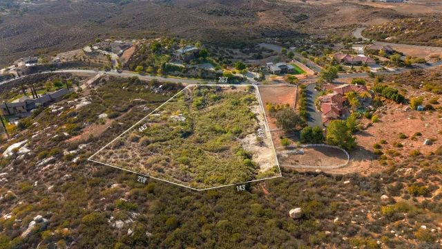 a view of a yard with a trees