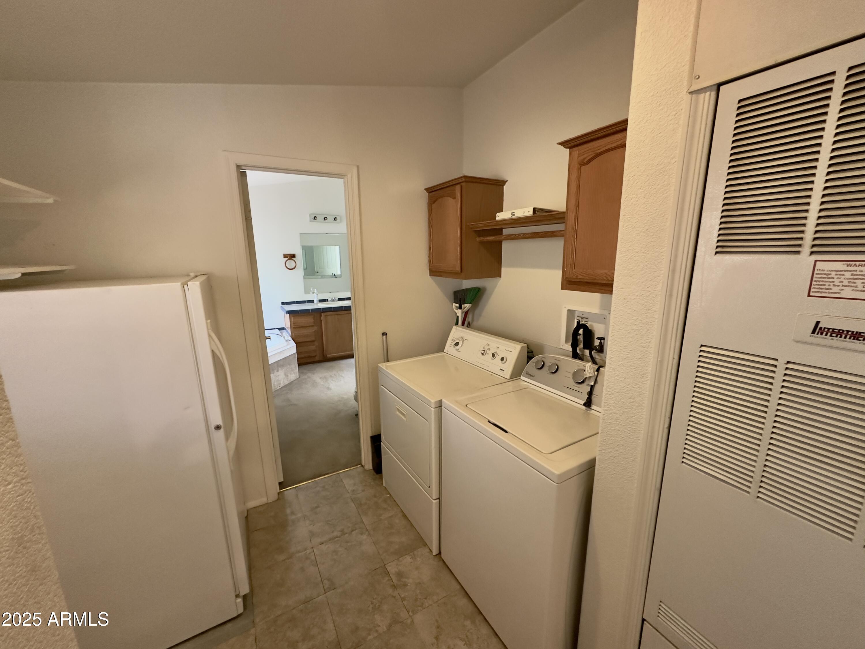 7672 Mesa Vista Payson, AZ 85541 - Photo 17 of 24 a utility room with dryer and washer