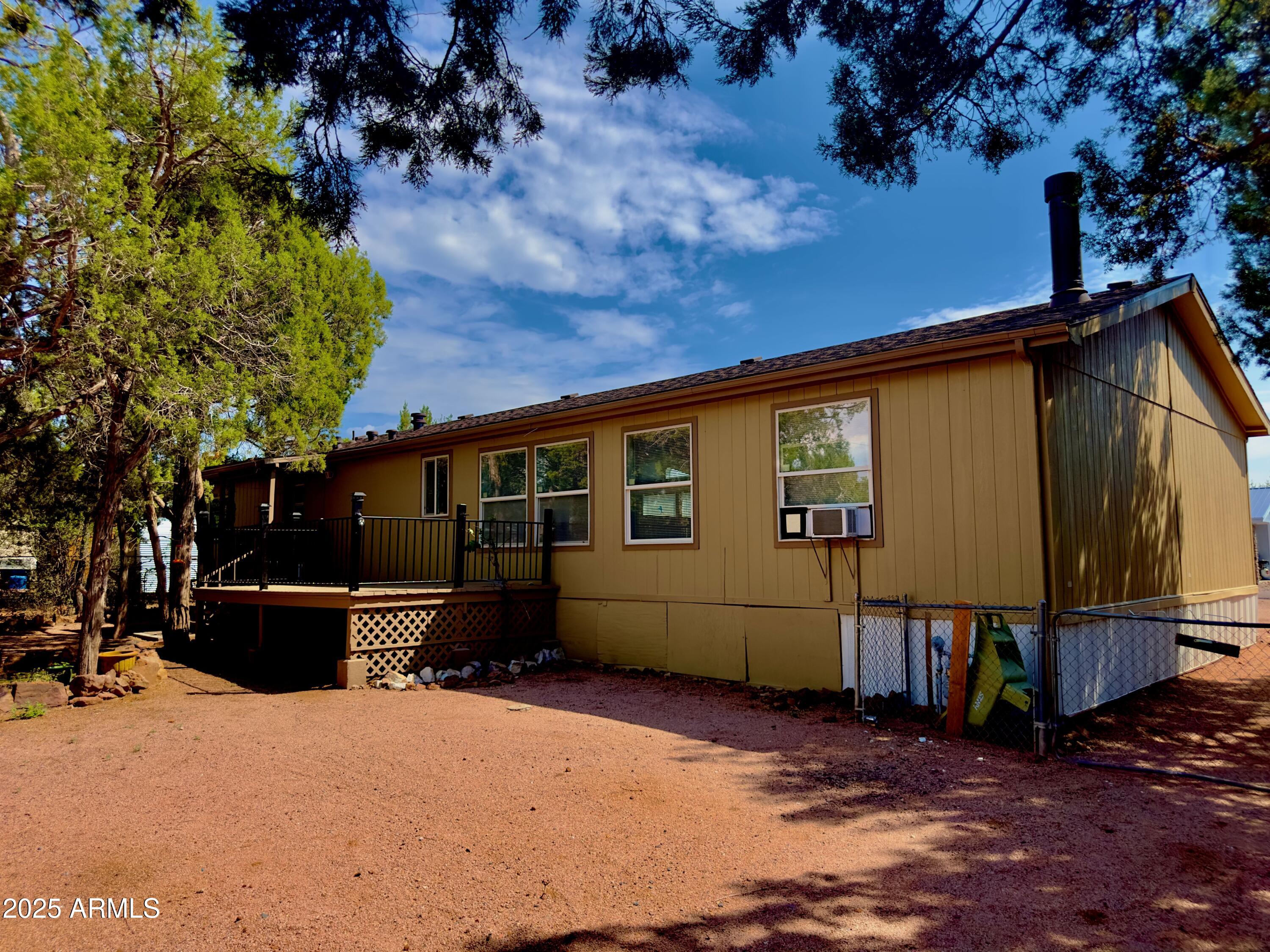 7672 Mesa Vista Payson, AZ 85541 - Photo 24 of 24 a view of a house with a yard
