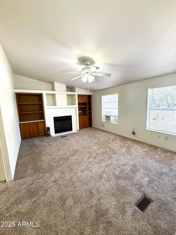 a view of a livingroom with a fireplace