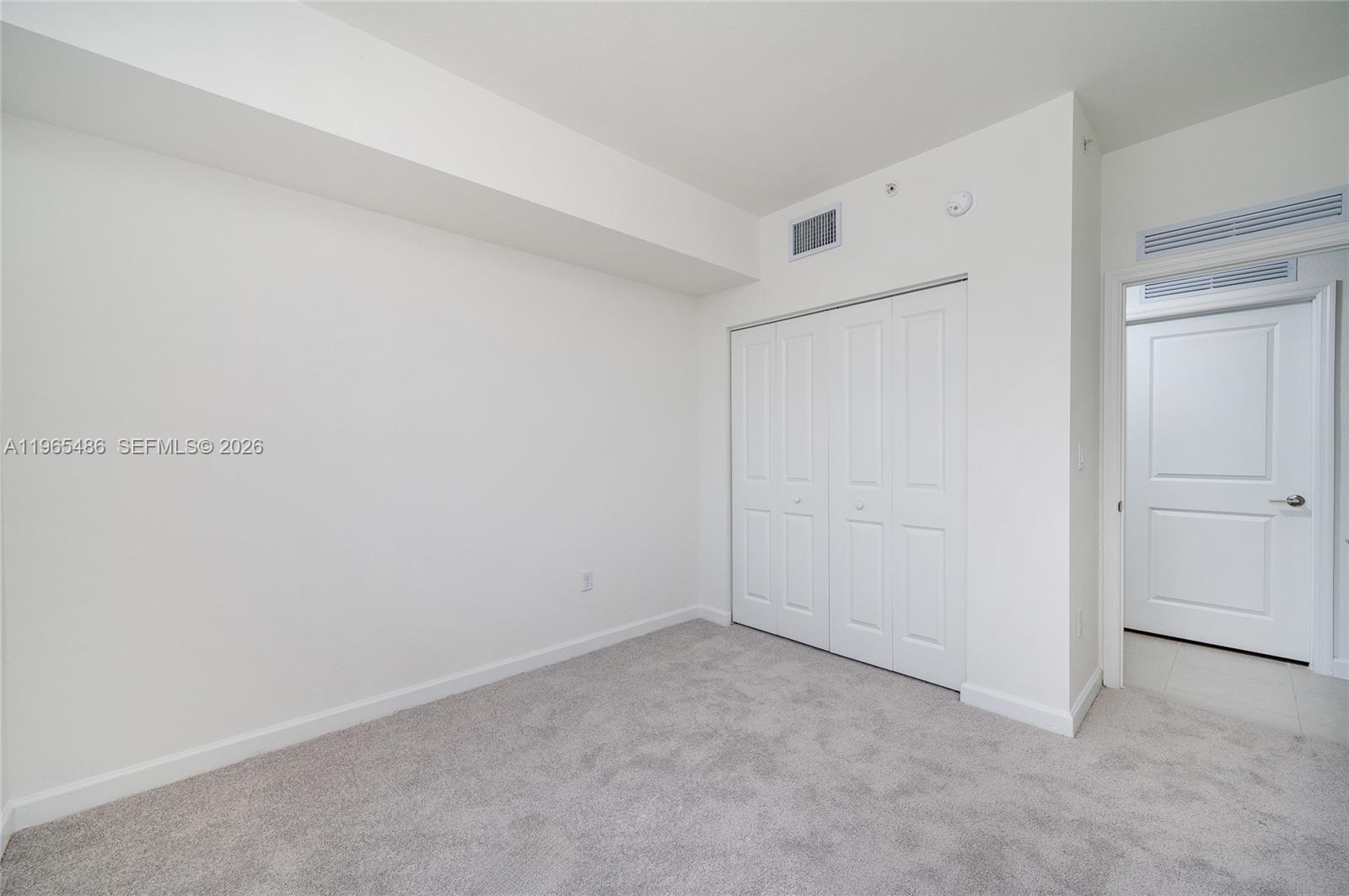 12470 Southwest 248th Street, Unit 1 Homestead, FL 33032 - Photo 30 of 35 a view of an empty room