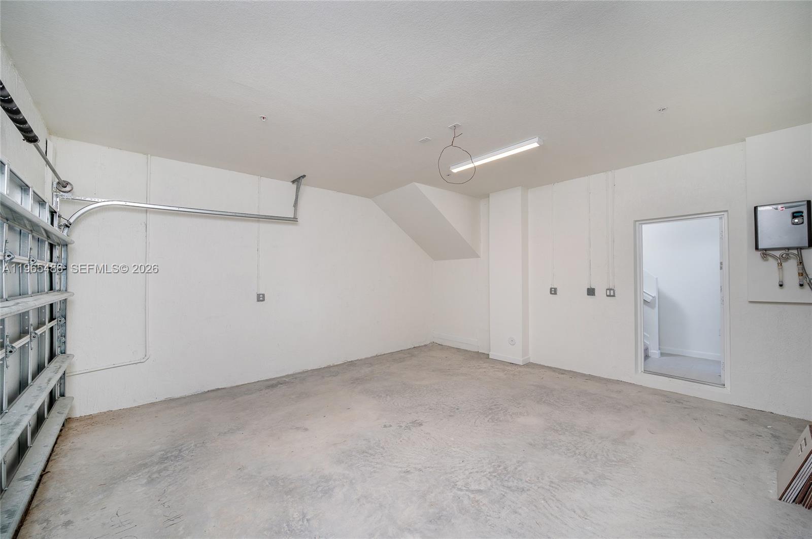 12470 Southwest 248th Street, Unit 1 Homestead, FL 33032 - Photo 5 of 35 a view of an empty room