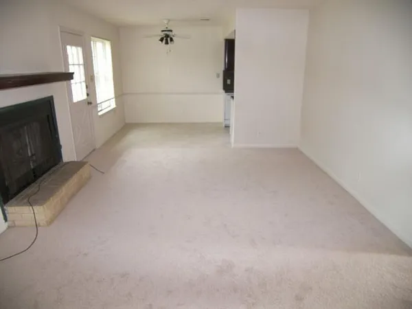 an empty room with windows