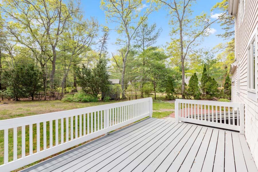 84 Cap'n Lijah's Road Centerville, MA 02632 - Photo 14 of 24 a view of a wooden deck