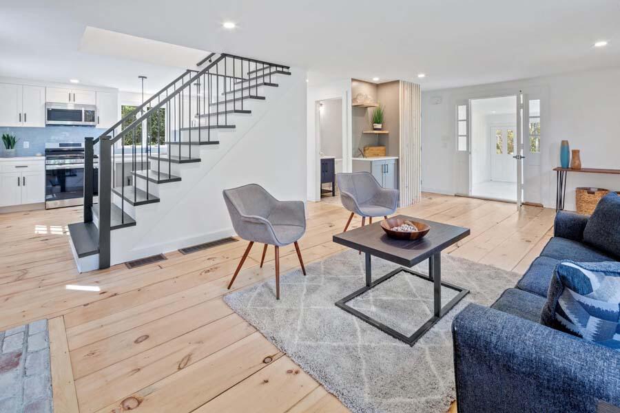 84 Cap'n Lijah's Road Centerville, MA 02632 - Photo 6 of 24 a living room with furniture and a table