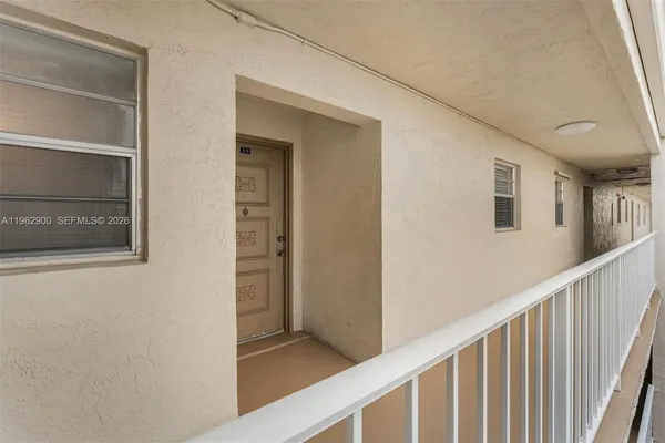 a view of a house with pool and a yard