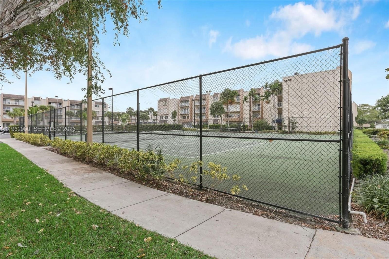 7777 Southwest 86th Street, Unit F1310 Miami, FL 33143 - Photo 32 of 37 Lighted Tennis Courts