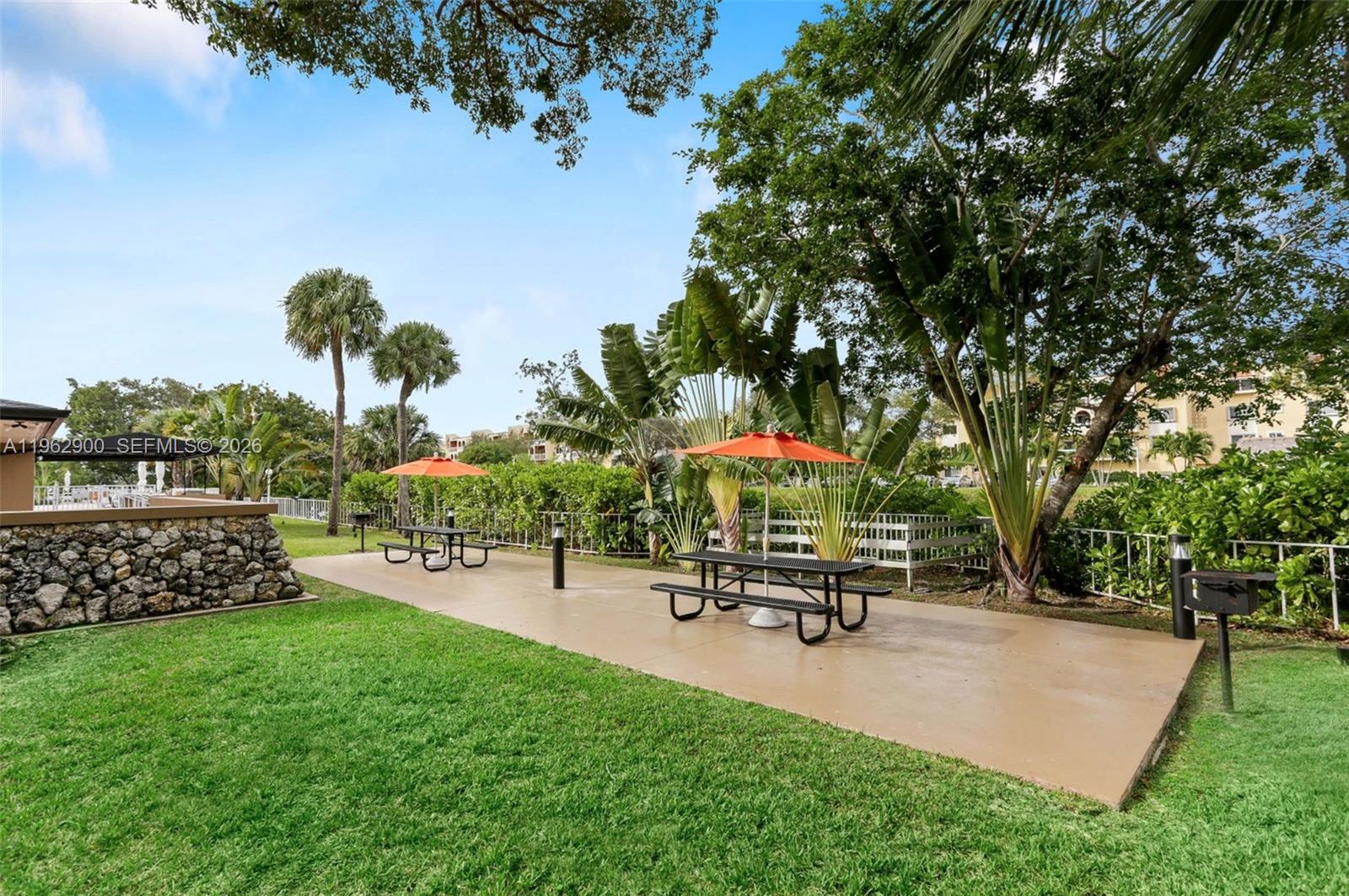 7777 Southwest 86th Street, Unit F1310 Miami, FL 33143 - Photo 33 of 37 Picnic and BBQ areas with canal views