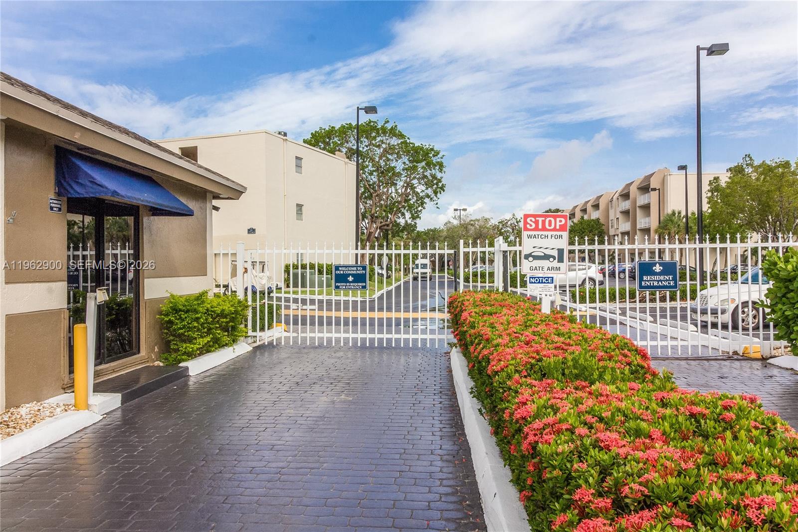 7777 Southwest 86th Street, Unit F1310 Miami, FL 33143 - Photo 36 of 37 Guard-gated entry