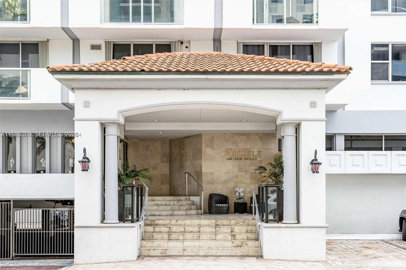 9195 Collins Avenue, Unit PH4 Surfside, FL 33154 - Photo 18 of 22 a view of a building with a balcony