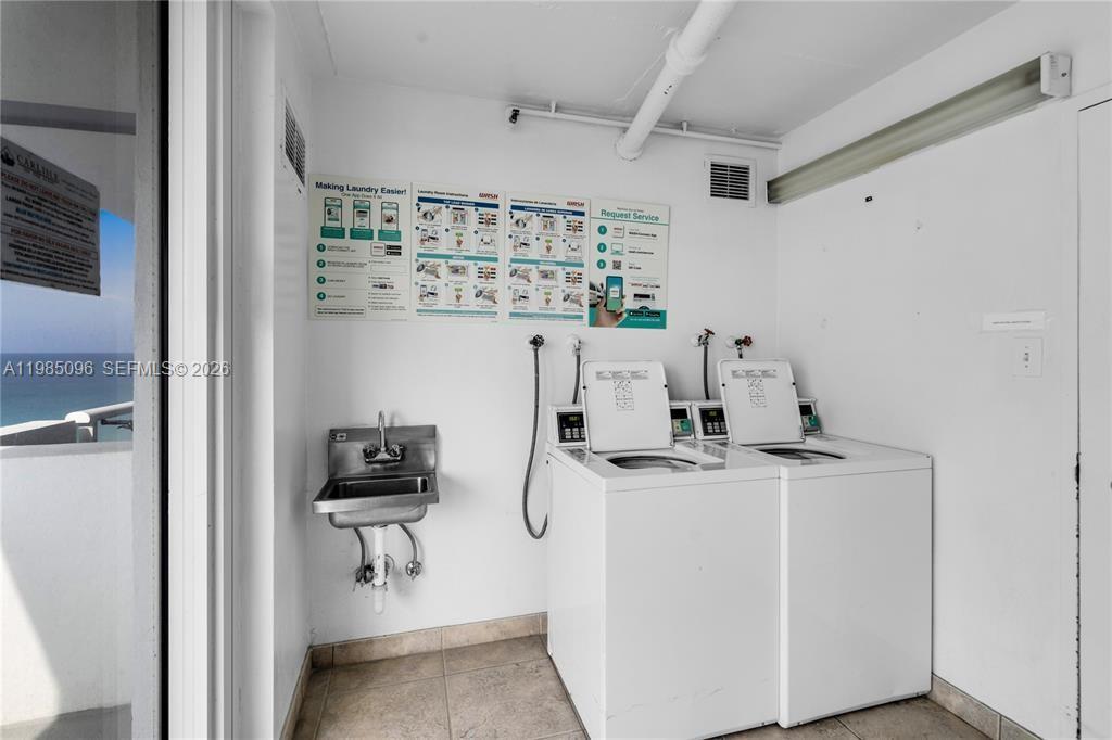 9195 Collins Avenue, Unit PH4 Surfside, FL 33154 - Photo 22 of 22 a room with storage and utility