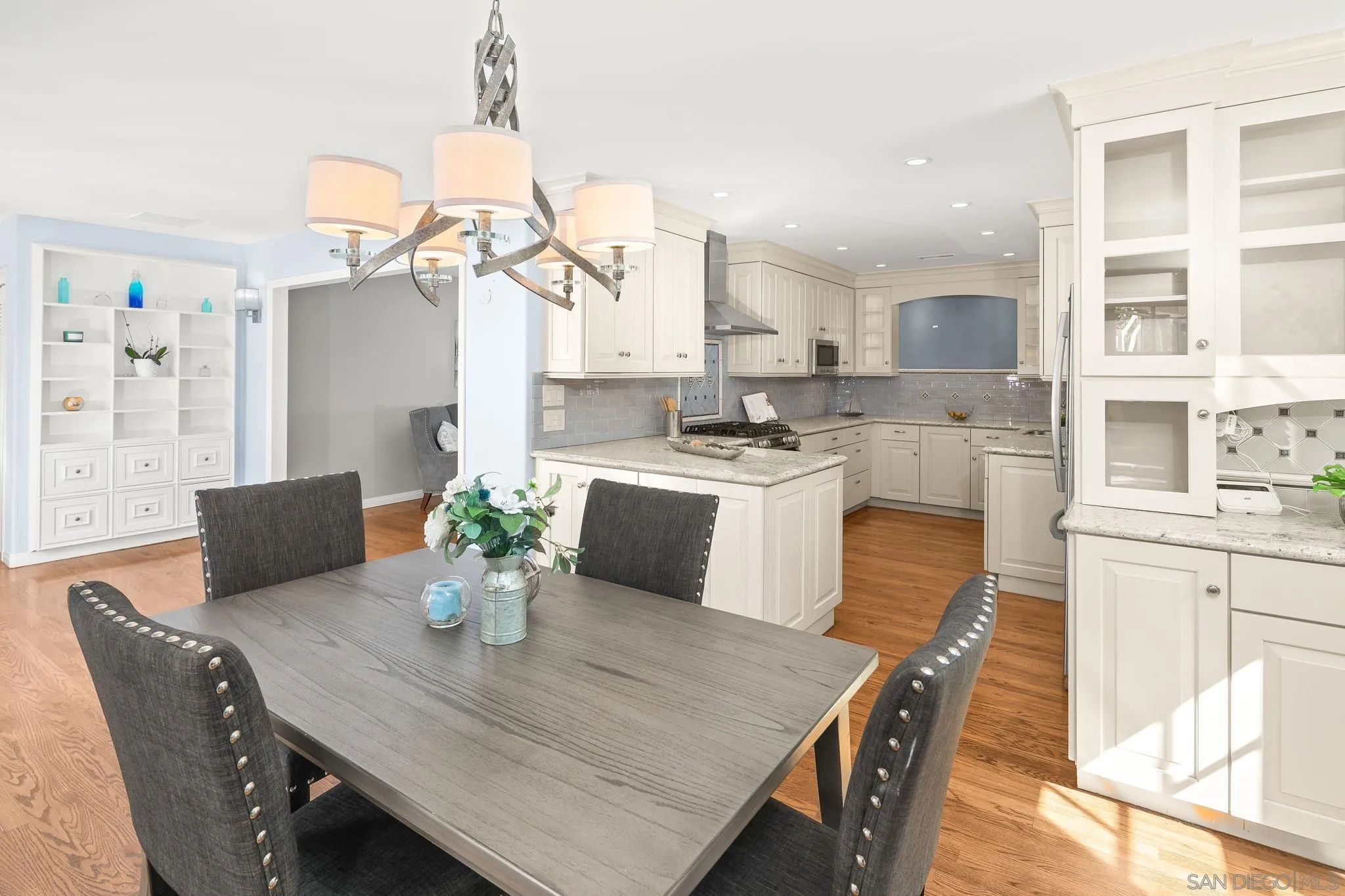 3733 La Cresta Drive San Diego, CA 92107 - Photo 12 of 57 a view of a dining room with furniture window and wooden floor