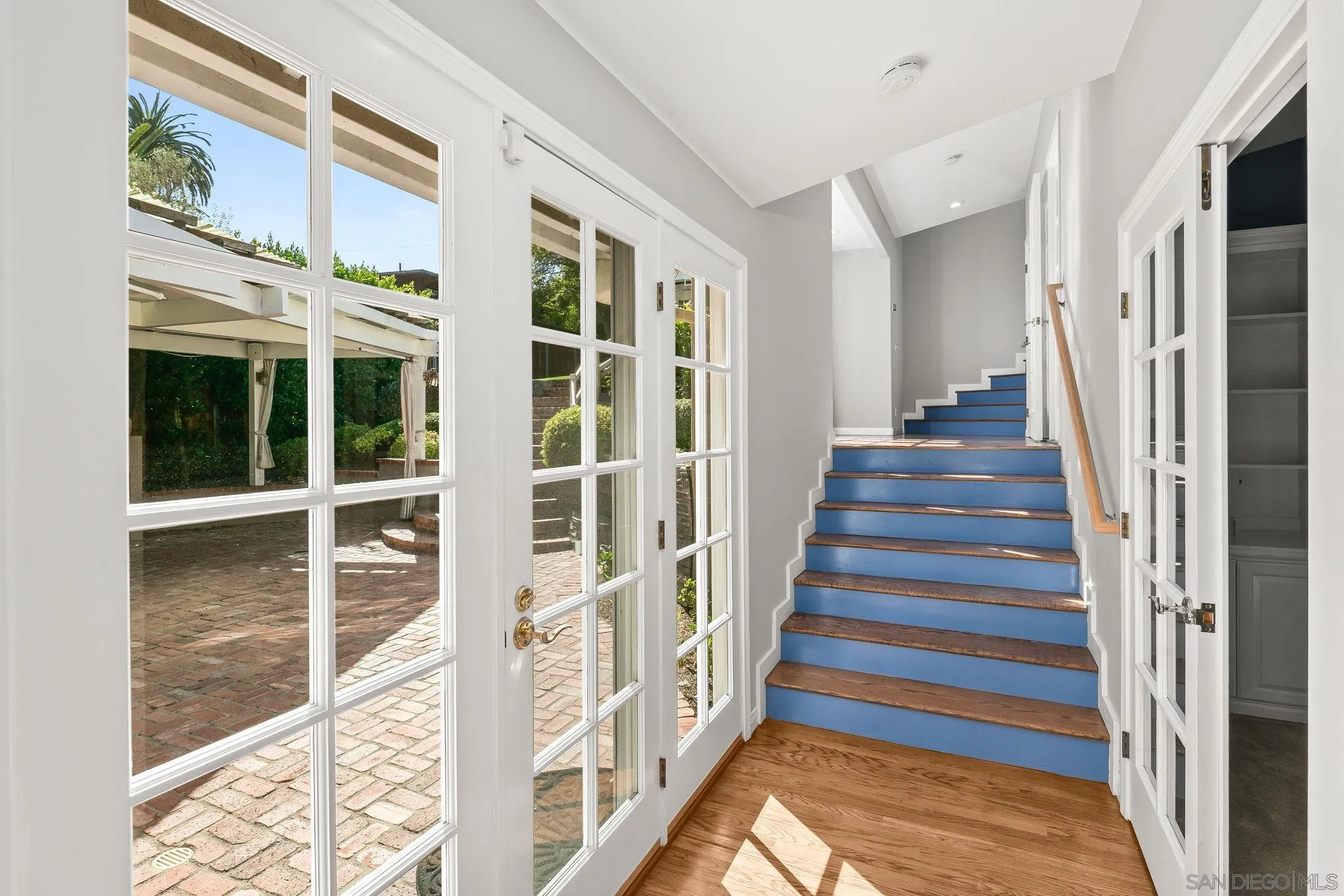 3733 La Cresta Drive San Diego, CA 92107 - Photo 21 of 57 a view of staircase with white walls and windows