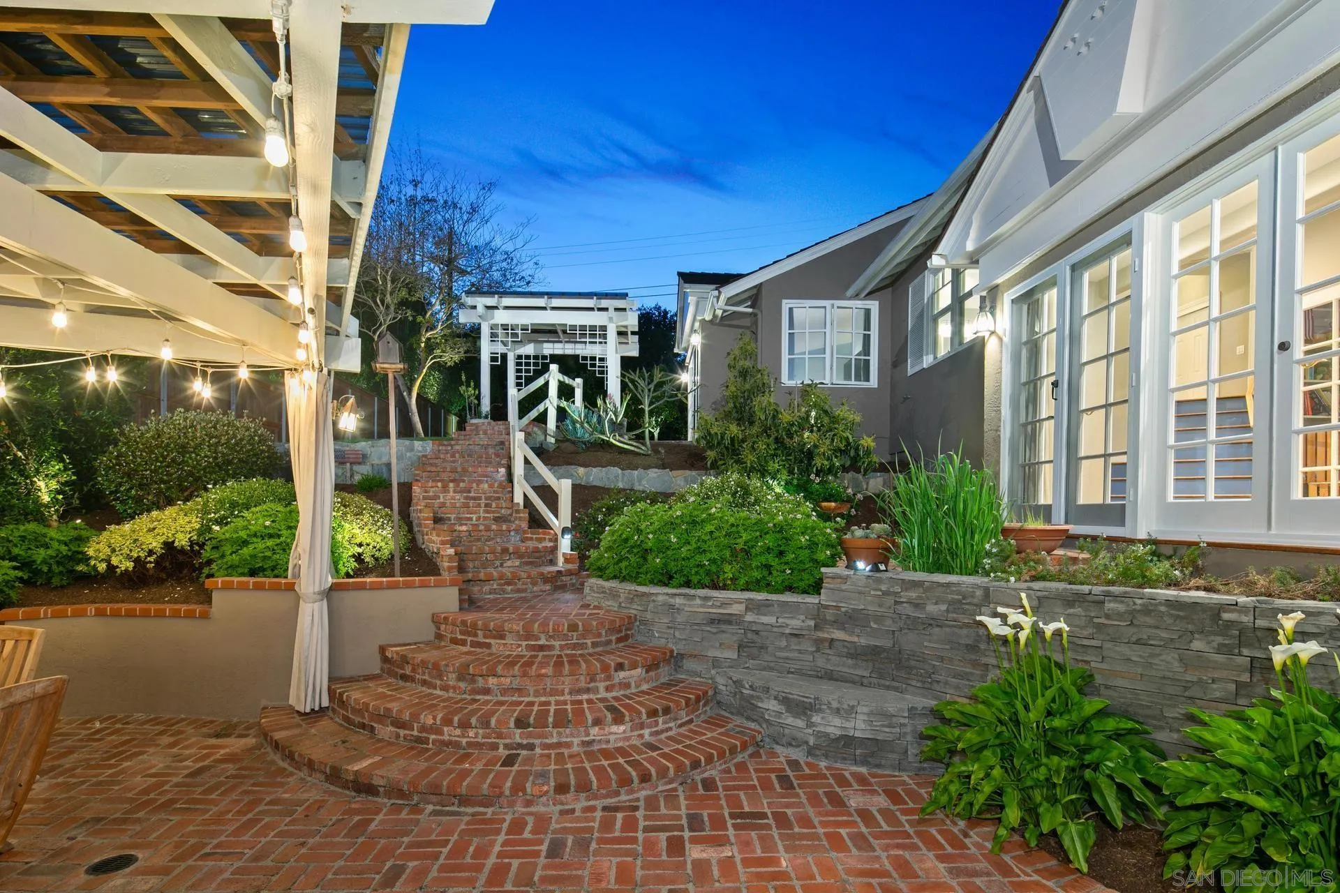 3733 La Cresta Drive San Diego, CA 92107 - Photo 52 of 57 a view of a brick house with a yard