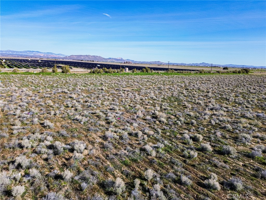 10400 West Ave B Lancaster, CA 93536 - Photo 35 of 43 a view of a room with street view and a mountain view