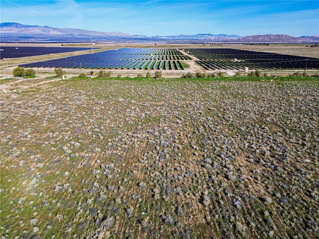 10400 West Ave B Lancaster, CA 93536 - Photo 7 of 43 a view of water heater and a floor to ceiling window