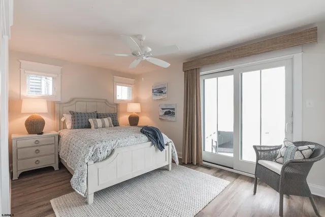 a bathroom with a double vanity sink mirror and shower