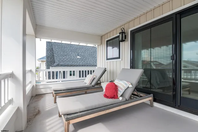 a view of a terrace with chairs