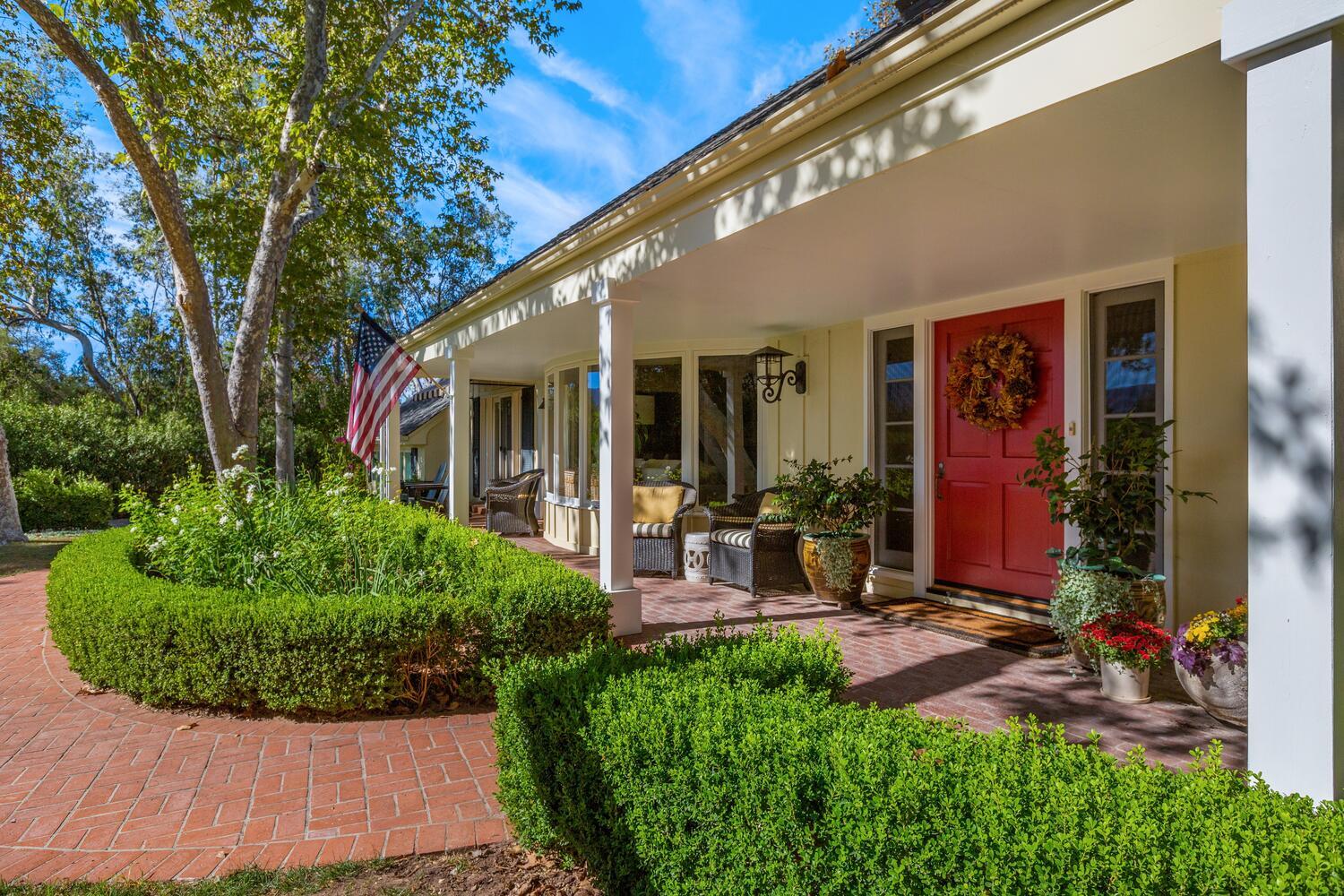 828 Foothill Lane Ojai, CA 93023 - Photo 2 of 40 a view of a house with sitting area and garden