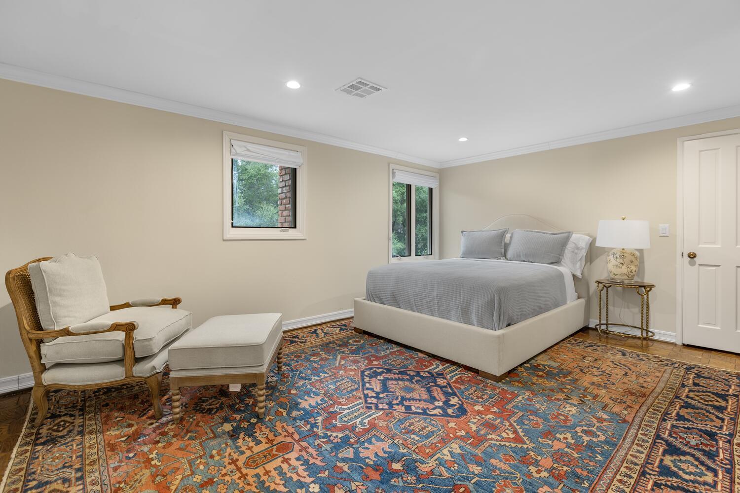 828 Foothill Lane Ojai, CA 93023 - Photo 22 of 40 a bedroom with a bed and wooden floor