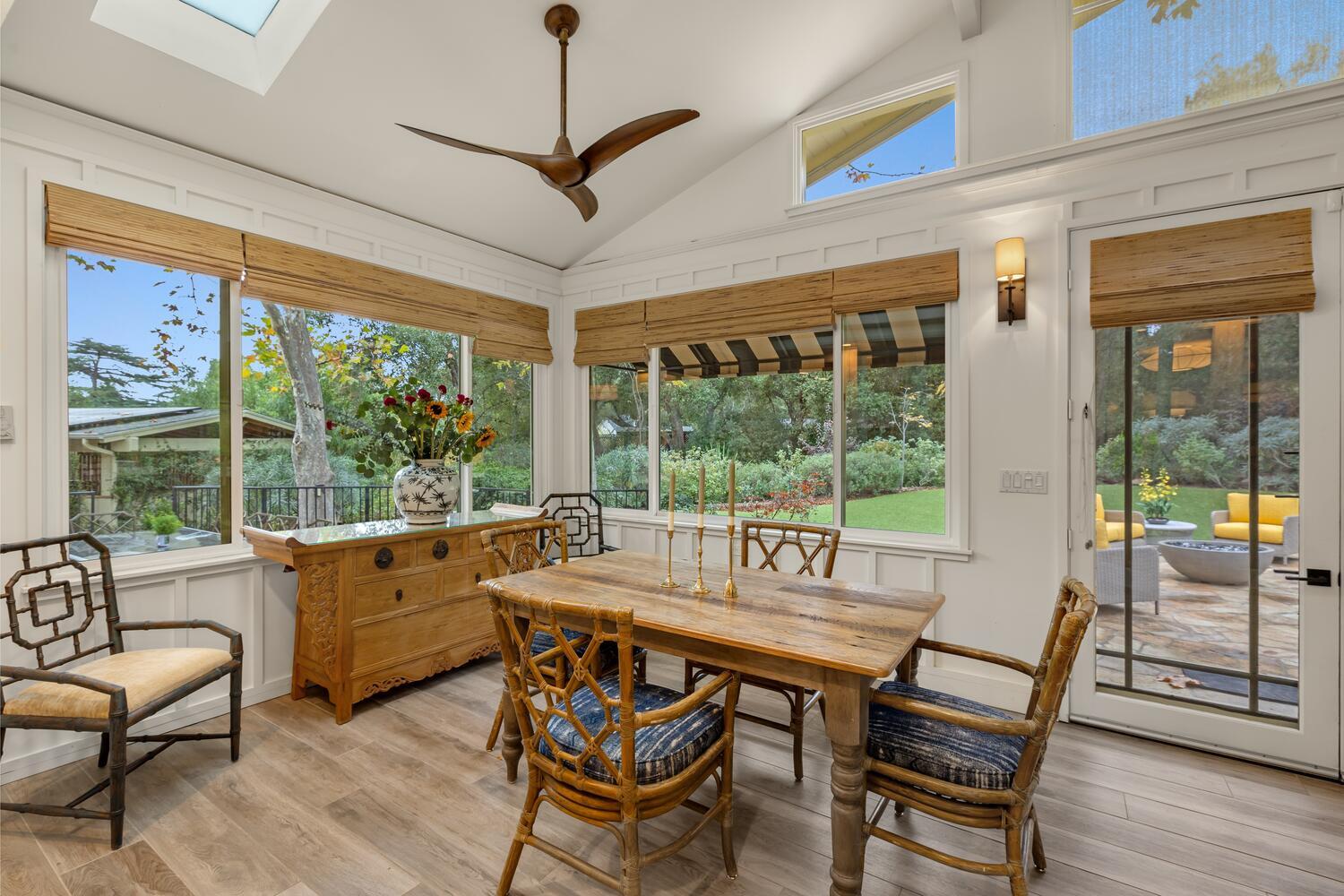828 Foothill Lane Ojai, CA 93023 - Photo 26 of 40 a dining room with furniture a chandelier and wooden floor