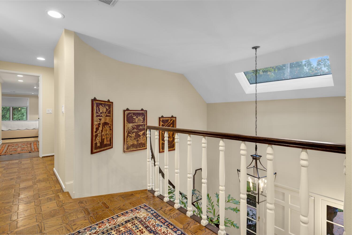 828 Foothill Lane Ojai, CA 93023 - Photo 28 of 40 a view of a hallway with paintings on the walls